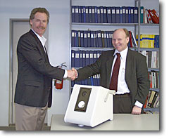 Peter Klein, President of KLN (right) with Dean Taylor, President of Generation II Orthotics at delivery of the scanner prototype. Click to view larger image.